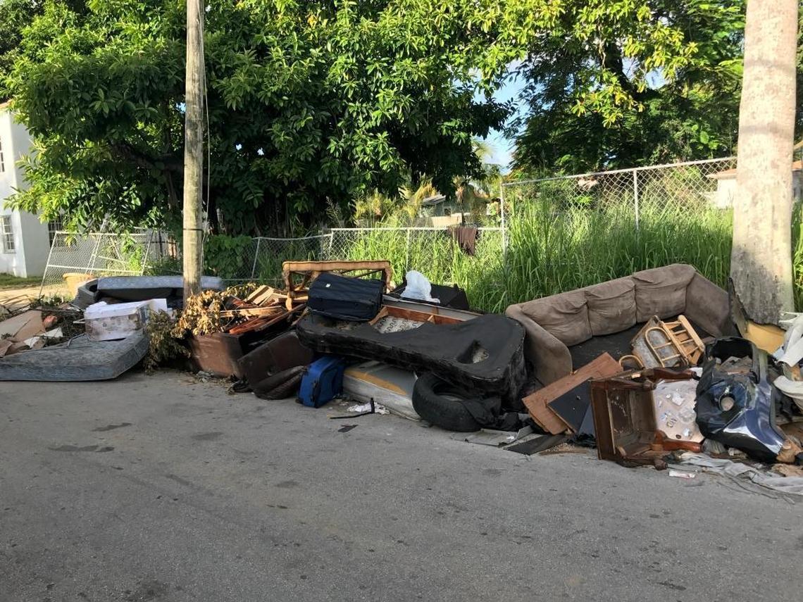 Trash is being dumped outside a trailer park in Little River. It could be dangerous when Irma hits.