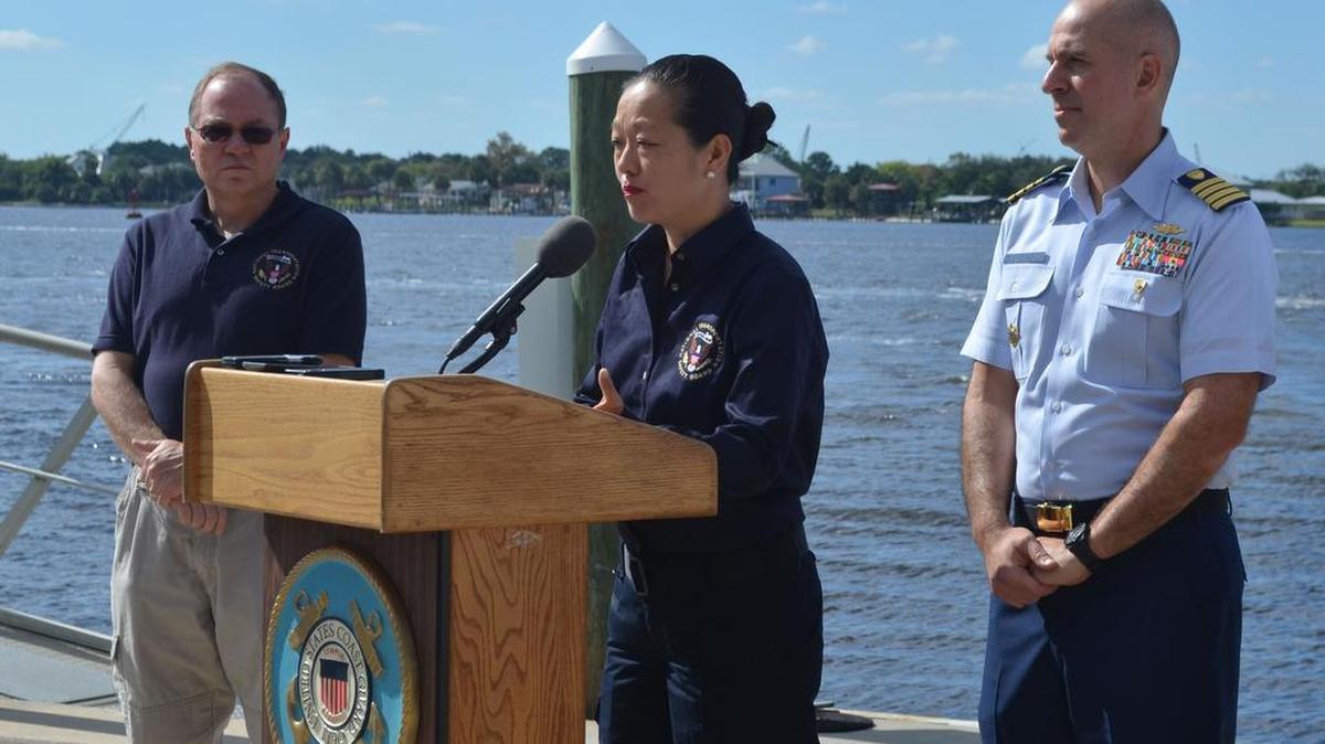 
National Transportation Safety Board Vice Chairman T. Bella Dinh-Zarr, center, at a press conference Wednesday that included Coast Guard Capt. Mark Fedor, right, and federal accident investigator Tom Roth-Roffy. With the search for survivors over, work will now focus on determining what caused the El Faro to lose power and sink. 
