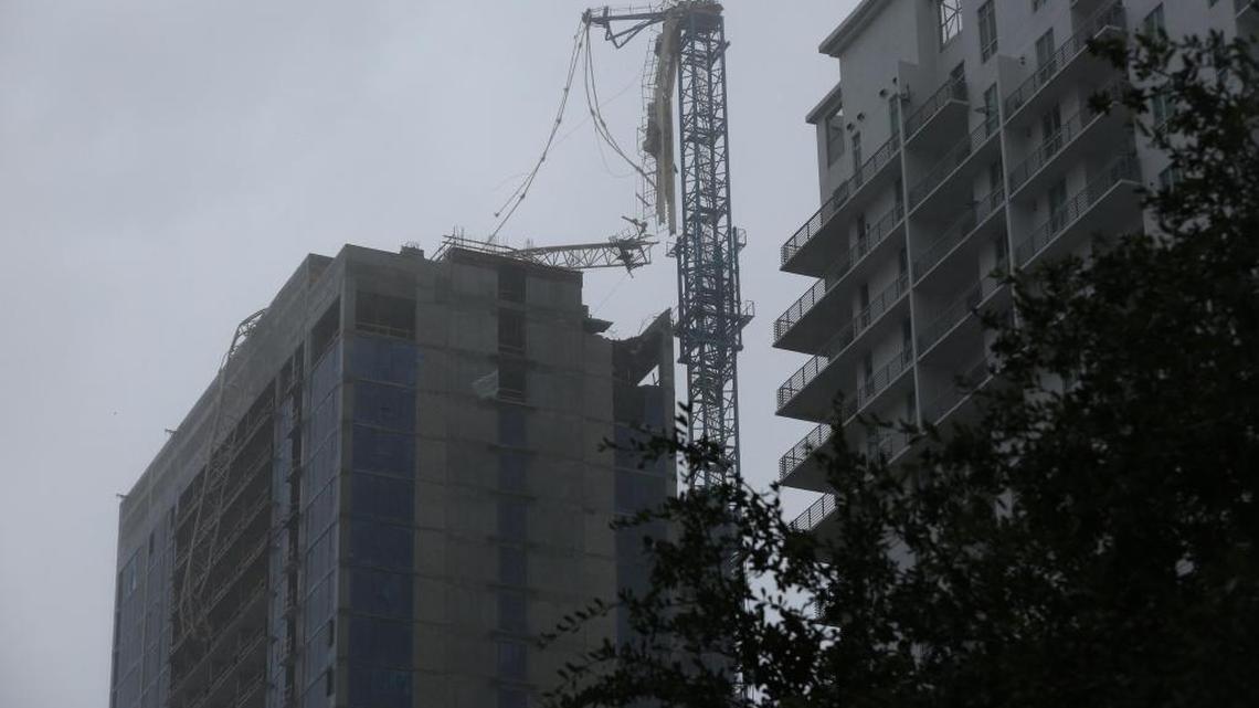 A construction crane snapped off the Vice apartment tower in downtown Miami on Sunday, Sept. 10, 2017, during Hurricane Irma. The building is under construction. Vice developer Property Markets Group said Monday a second crane must be erected to remove the damaged crane and repair any damage to the unfinished apartment tower.