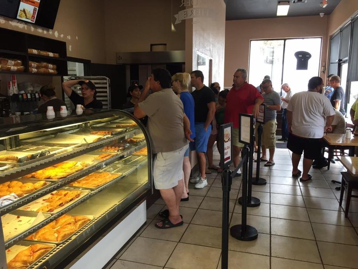 Lines of hungry customers that snaked back on themselves started forming as early as 5:30 a.m. at a Karla Bakery tucked inside a warehouse district on Southwest Fourth Street and 70th Avenue.
