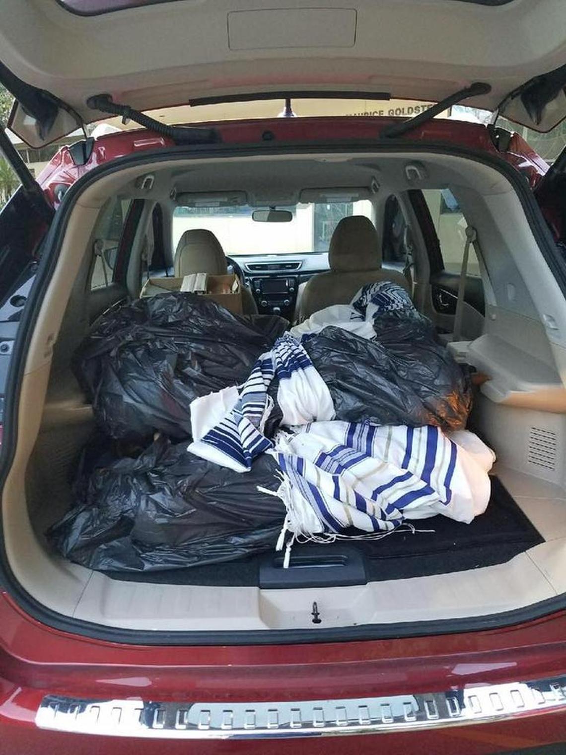 The six torahs of Temple Beth Orr in Coral Springs were loaded into Steve Feinstein’s car Friday morning.