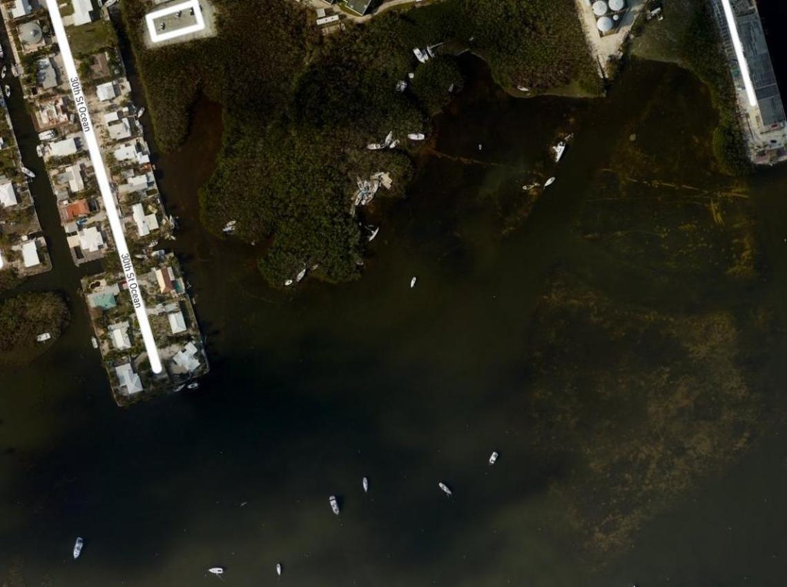 Boats tossed from the City of Marathon Marina sit in mangroves following Hurricane Irma as seen from the NOAA satellite imagery website.