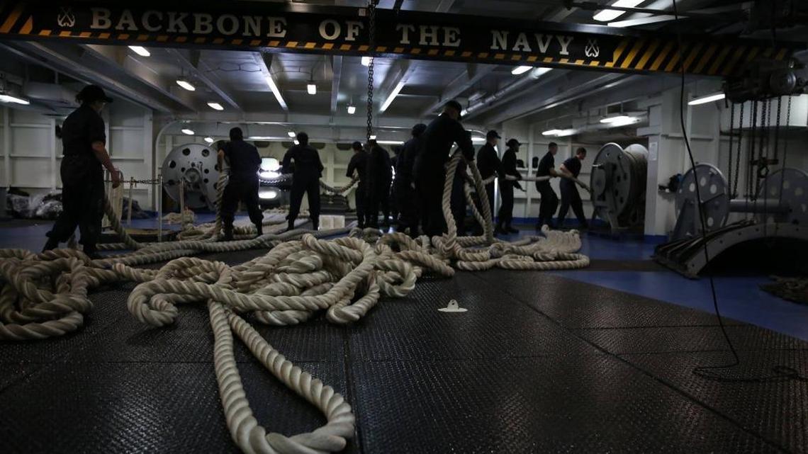 Sailors aboard the Nimitz-class aircraft carrier USS Abraham Lincoln, getting underway out of Norfolk, Virginia, on Sept. 9, 2017 to be in position to provide humanitarian relief to victims of Hurricane Irma in this Navy handout photo.