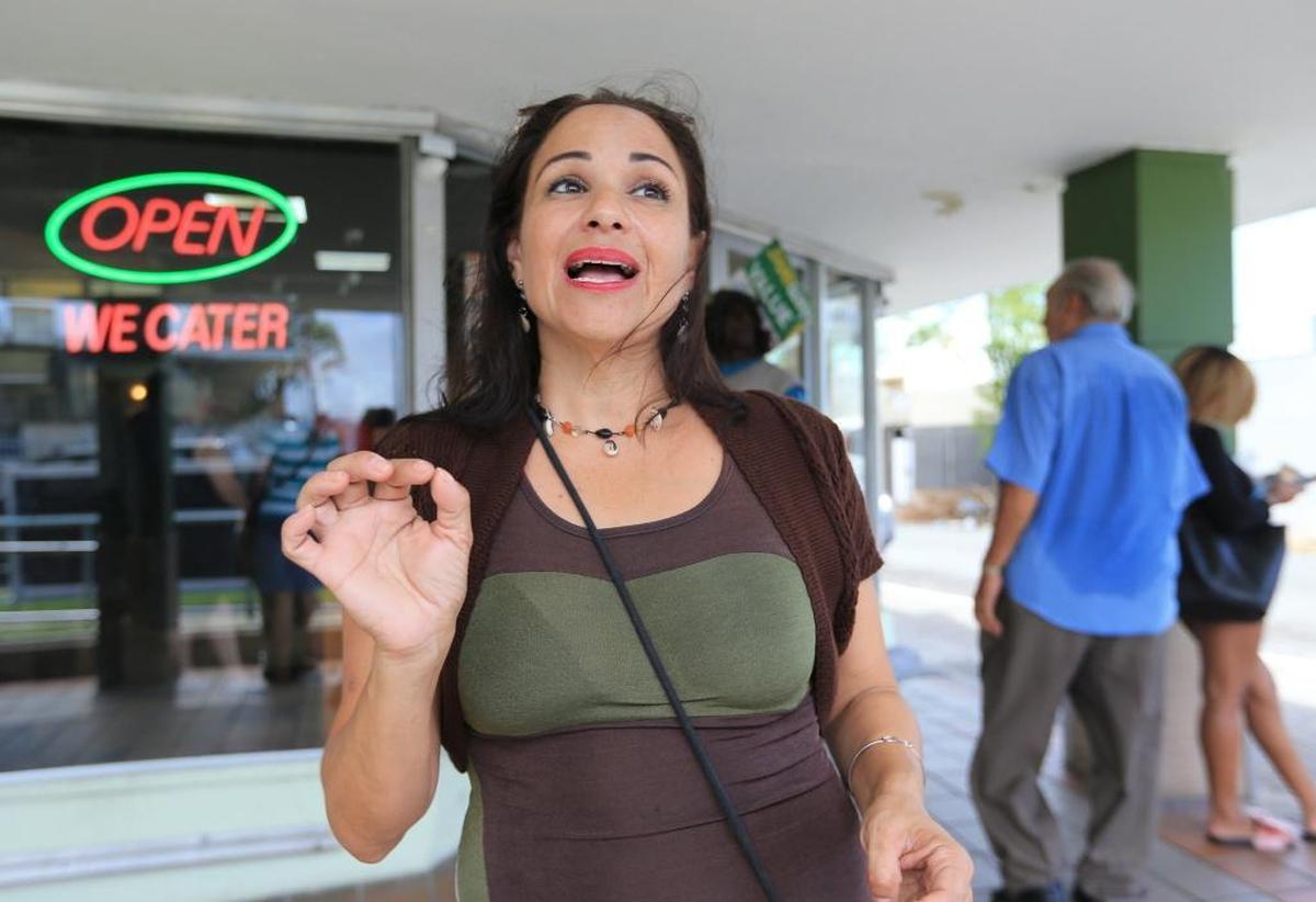 Witness, Jessica Rojas, talks about a Subway restaurant robbery where a state prosecutor, his girlfriend and the suspect were shot in Puerto Rico on Tuesday, October 17, 2017.