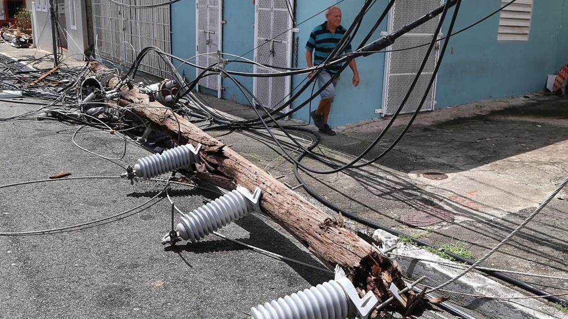 A view of a broken power line pole on a street in Yabucoa in the aftermath of Hurricane Maria.