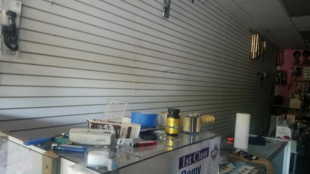 A beauty supply store in Overtown that was broken into and robbed during Hurricane Irma. The wall is normally lined with weaves and other beauty supply products.