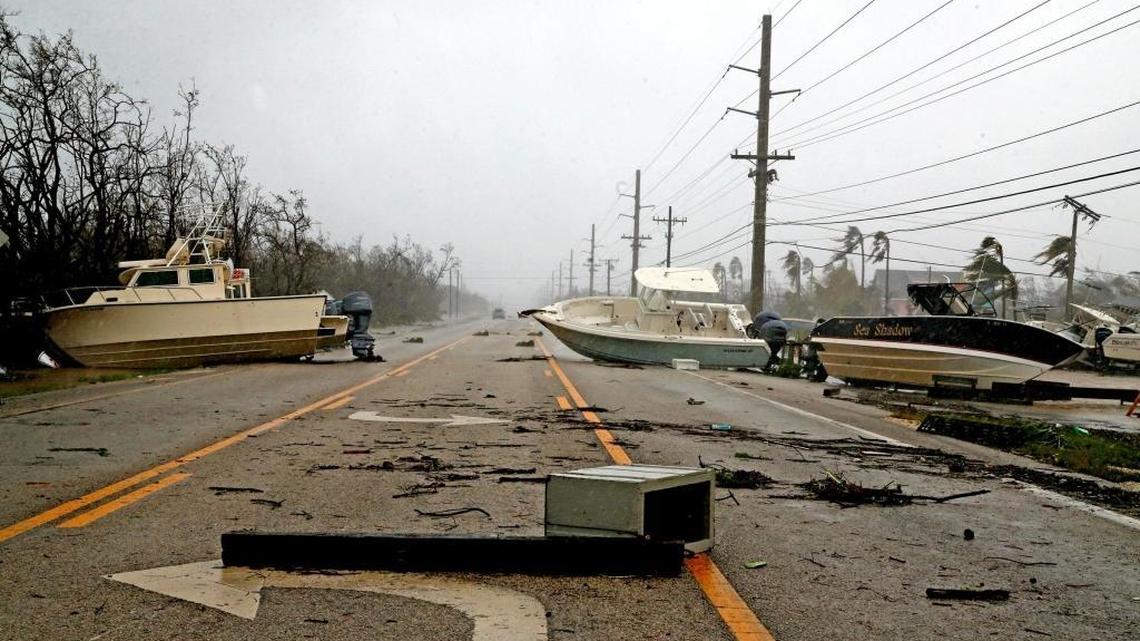 Boats block the Overseas Highway after Hurricane Irma surge tossed boats, cars, sheds, and appliances onto the highway throughout the middle Keys, Septmeber 10, 2017.