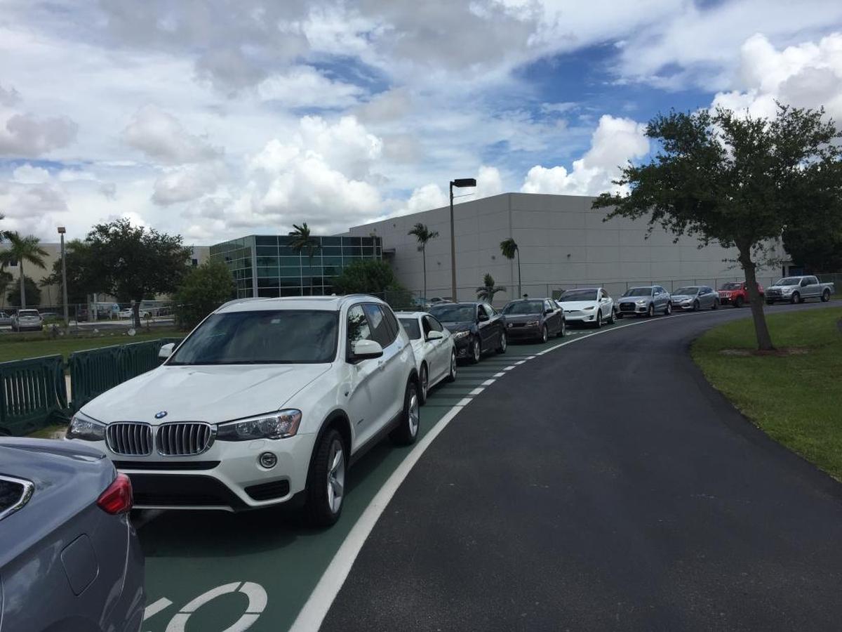 In anticipation of Hurricane Irma, motorist wait in line for sand bags at Doral Central Park on Sept. 6, 2017.