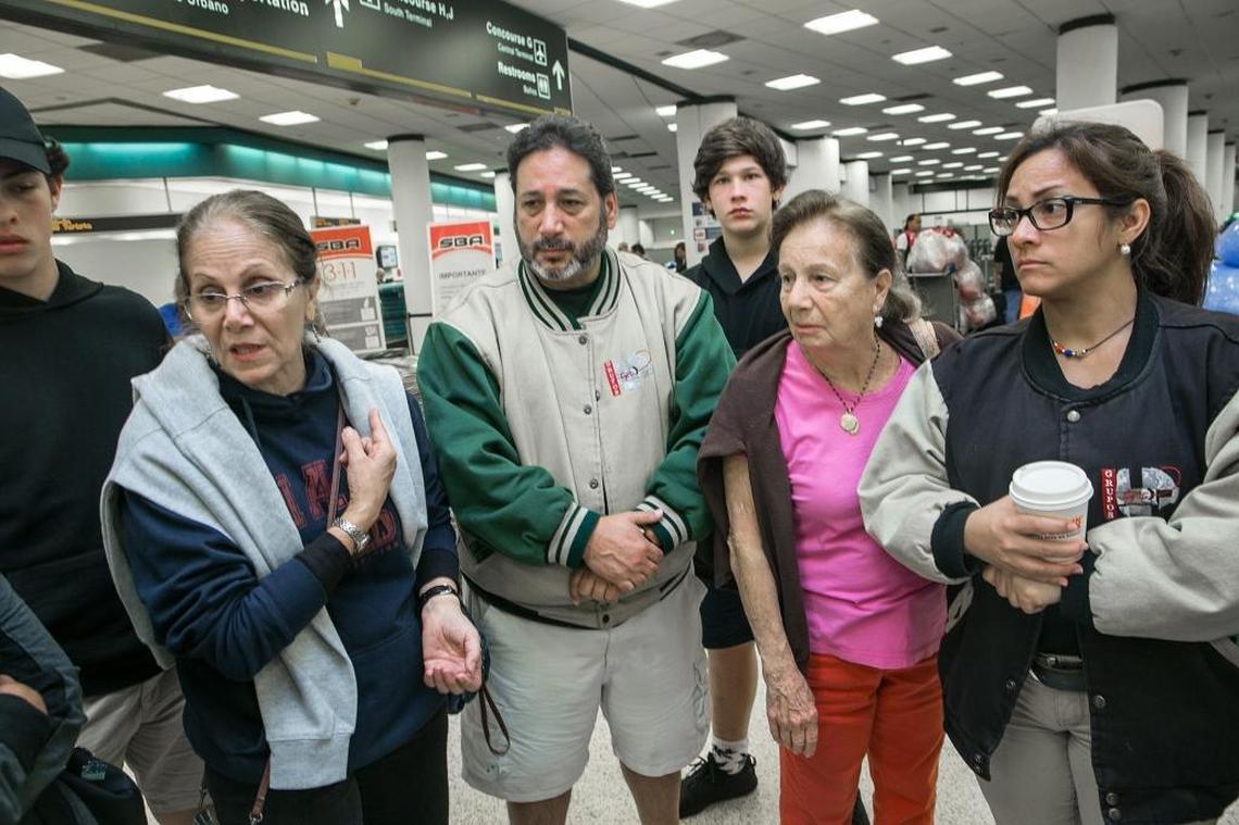 Beniamina Di Marino, left, and other passengers complains of the horrible way they were treated by Santa Bárbara Airlines, after having their flight canceled and having to sleep on the floor at Miami International Airport days.
