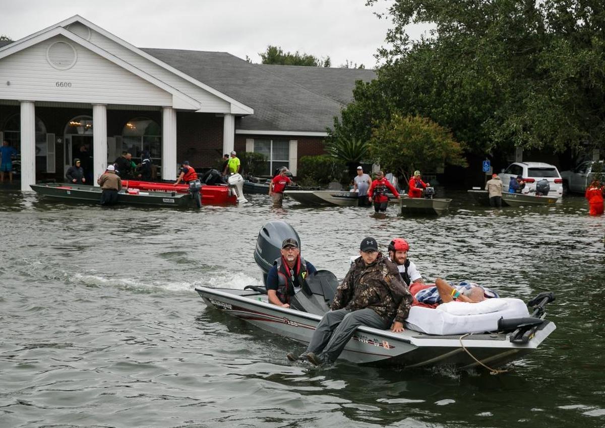 On Aug. 30, search and rescue volunteers rescued patients from the flooded Cypress Glen nursing home in Port Arthur, Texas.