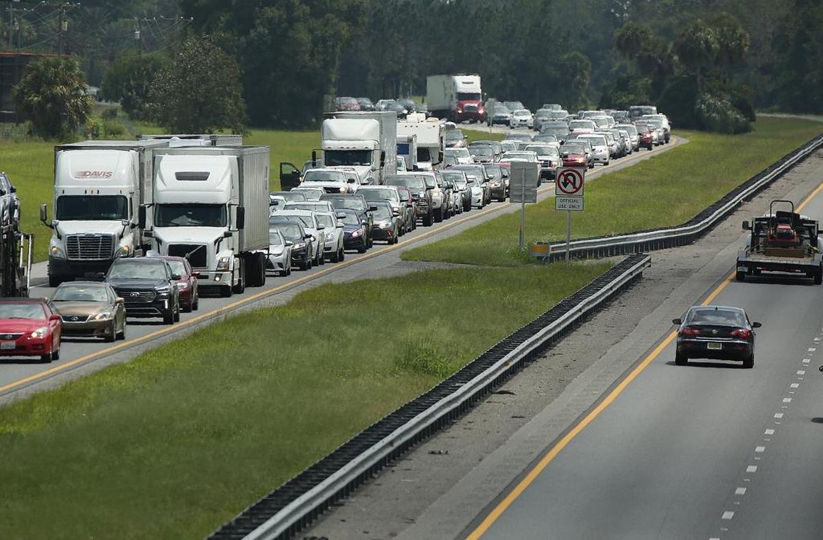 Traffic rolls at a crawl on the northbound lanes of Florida’s Turnpike near the intersection of I-75 in Wildwood on Friday, September 8, 2017. Motorists fled the state ahead of Hurricane Irma.
