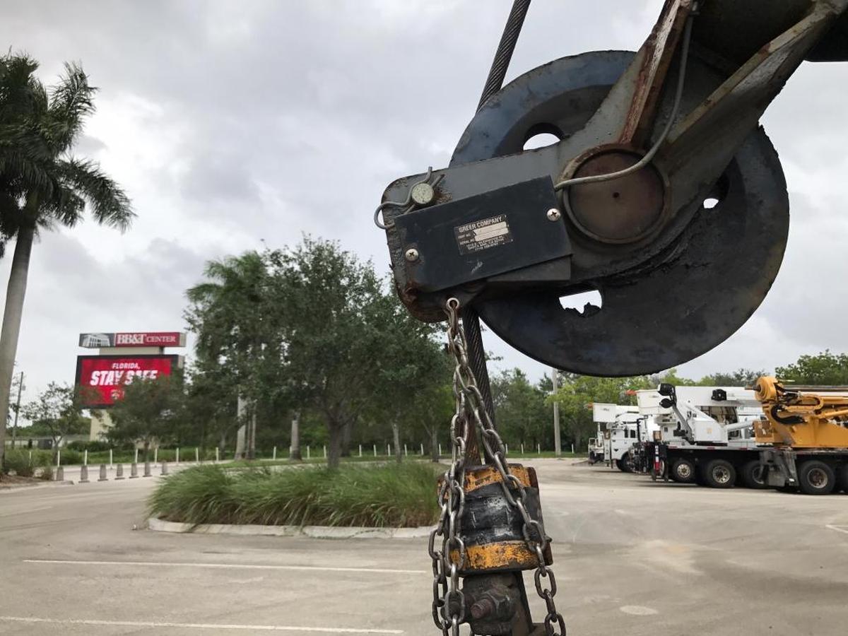 A large crane sits out in front of the Florida Panthers arena in Sunrise in anticipation for the large clean up effort from Hurricane Irma on Sept. 9, 2017. The BB&T Center video board, at left, reads ‘Florida Stay Safe.’