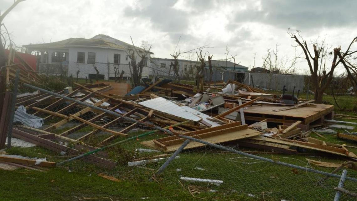In this Thursday, Sept. 7, 2017, photo, damage is left after Hurricane Irma hit Barbuda. Hurricane Irma battered the Turks and Caicos Islands early Friday as the fearsome Category 5 storm continued a rampage through the Caribbean that has killed a number of people, with Florida in its sights.