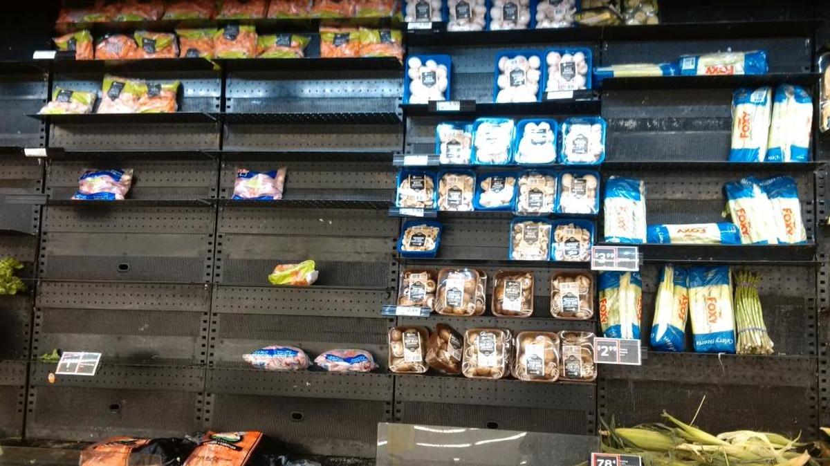 Sparsely stocked supermarket shelves, such as these in a Fresco y Más produce department, have been a post-Irma fact of life