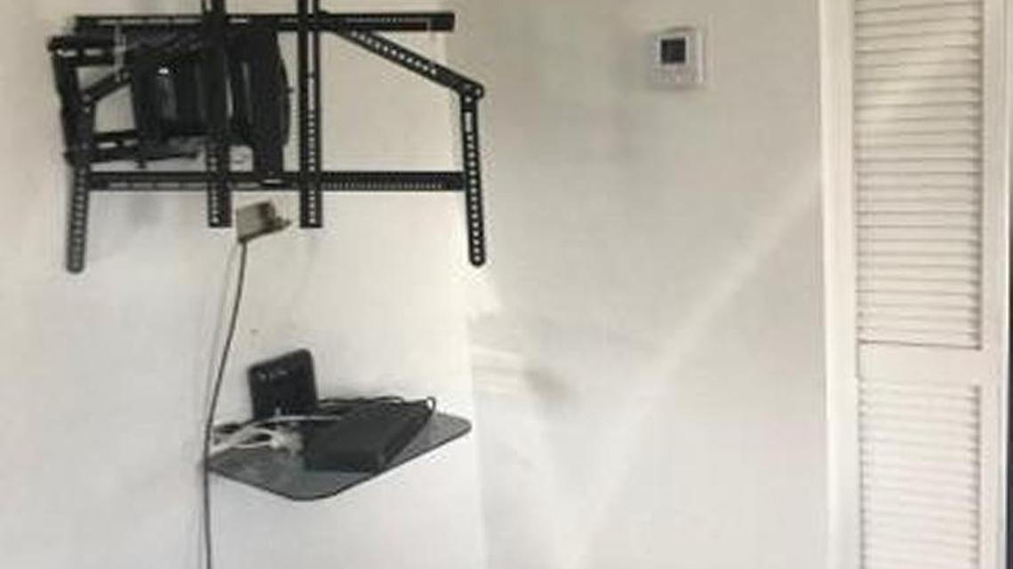 A television missing from a wall at the Junctions Loft in Little River after thieves broke in Sunday night during Hurricane Irma.