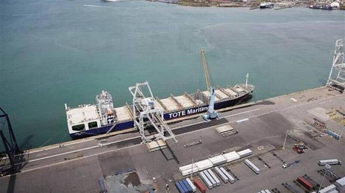 A container ship is seen docked at the port of San Juan as people deal with the aftermath of Hurricane Maria.