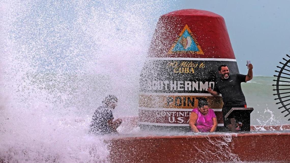 Key West resident Pedro Lara takes a selfie in front of the Southernmost Point in the USA monument on Saturday. With 130 mph winds from Hurricane Irma closing in early Sunday morning, conditions will quickly erode.