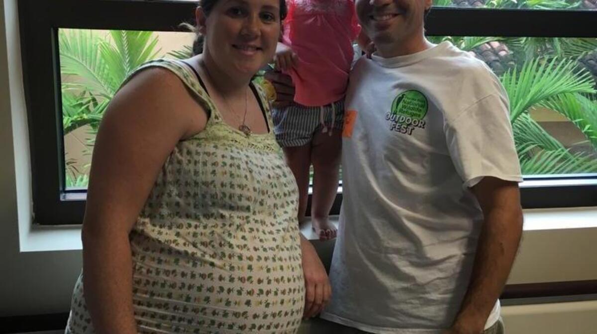 Stephanie and Adrian Besil and their one-year-old daughter, Iris, at Baptist Hospital Miami, where the family sought shelter from Hurricane Irma. Stephanie Besil is 31 weeks pregnant with identical twin boys. The Besils evacuated their home in Key Largo and insisted on staying near or in a hospital for the storm in case Stephanie Besil needs medical attention.