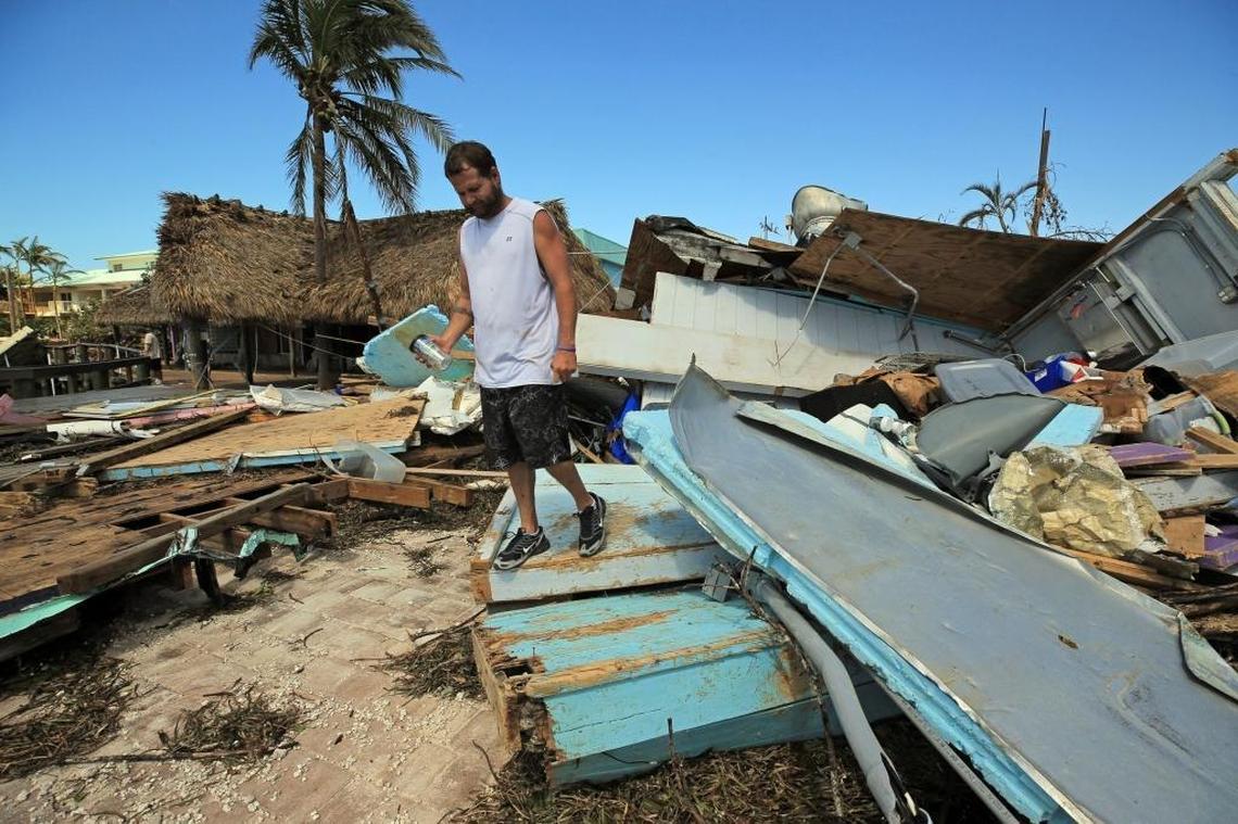 Eric Ward, the bartender at Key Largo's Snappers inspects the damage from Hurricane Irma at the popular restaurant on Tuesday, September 12, 2017.