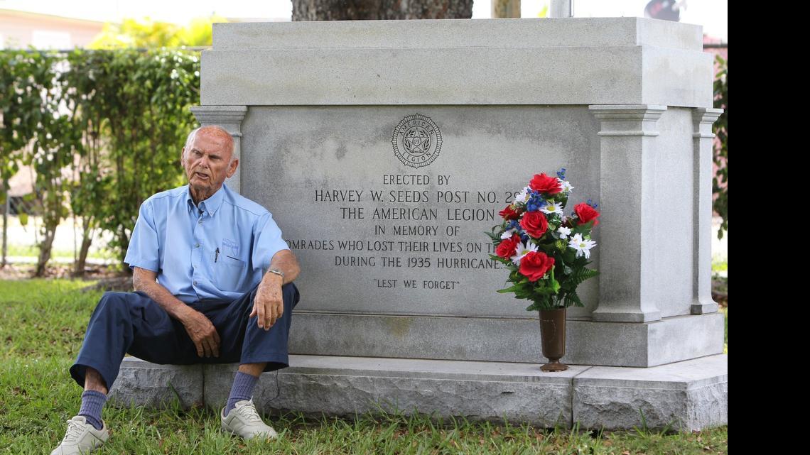 
Jerry Wilkinson sits on a granite monument at Miami’s Woodlawn Cemetery on Southwest Eighth Street where 74 U.S. soldiers are buried in unmarked graves after dying in one of the worst hurricanes to ever strike U.S. shores. Wilkinson and another vet have been fighting to have markers placed on the graves.
