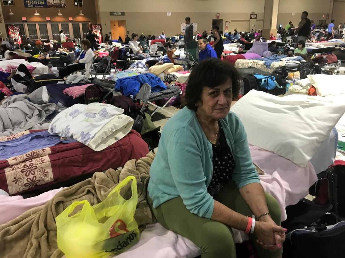 Maria Gonzalez of Key Largo checked in to the Tamiami Park shelter on Friday. The shelter at Miami-Dade County’s fairgrounds is one of the county’s two pet-friendly shelters.