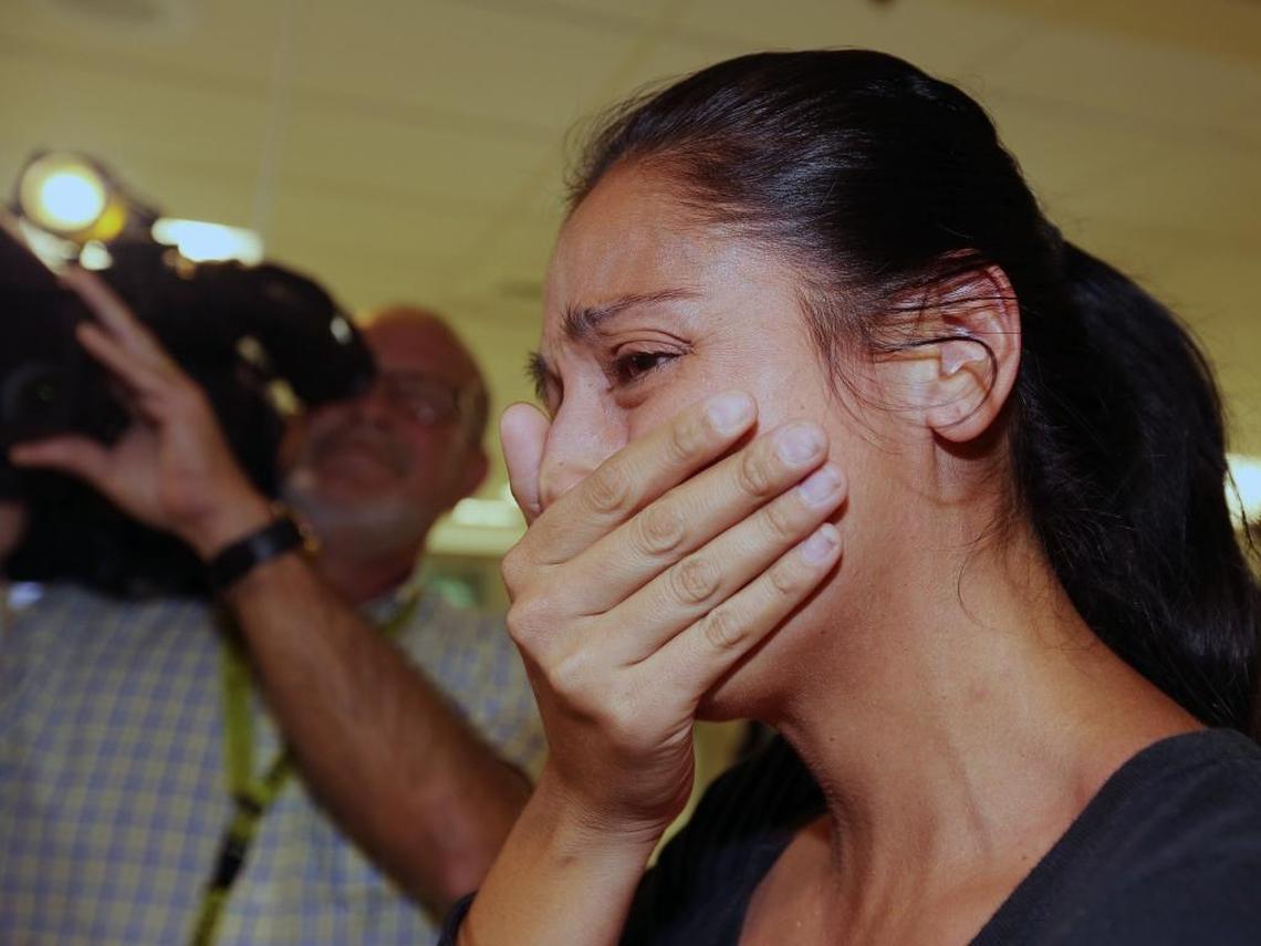 Puerto Rico resident Claudia Gonzalez breaks down upon arrival at Miami International Airport after being asked about the devastation in Puerto Rico.