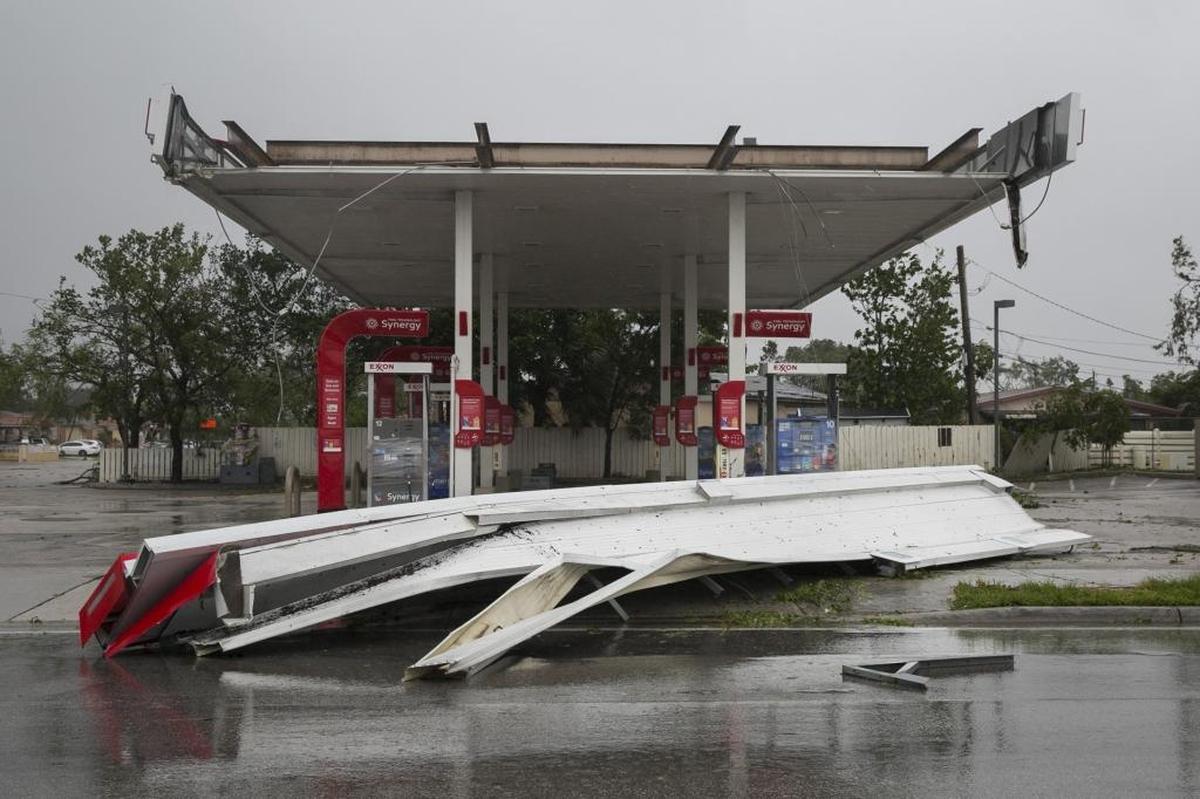 An Exxon gas station on Flagler Street had its roof torn off by hurricane force winds on Sunday.