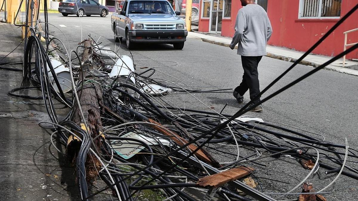 View of downed power lines on the streets of the town of Yabucoa town after Hurricane Maria went through Puerto Rico.