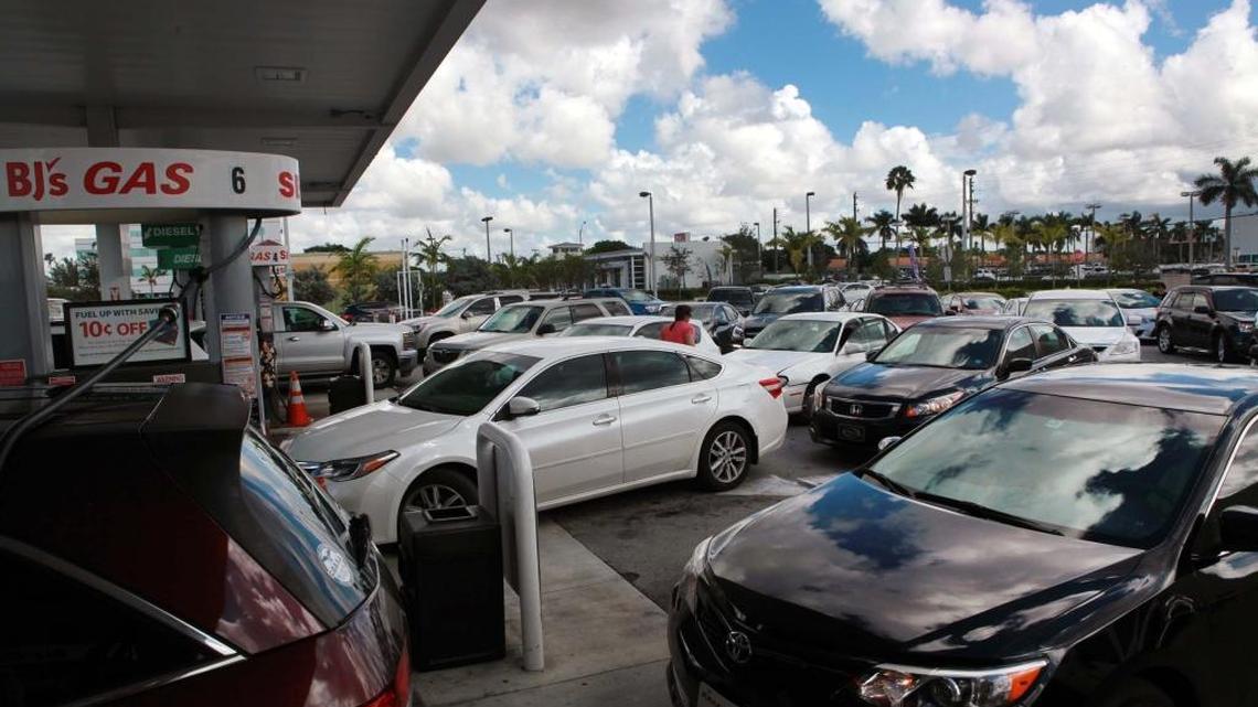 Cars line up on Wednesday, Oct. 5, 2016, at the BJ’s gas station at 7050 Coral Way to fuel up before Hurricane Matthew approaches.