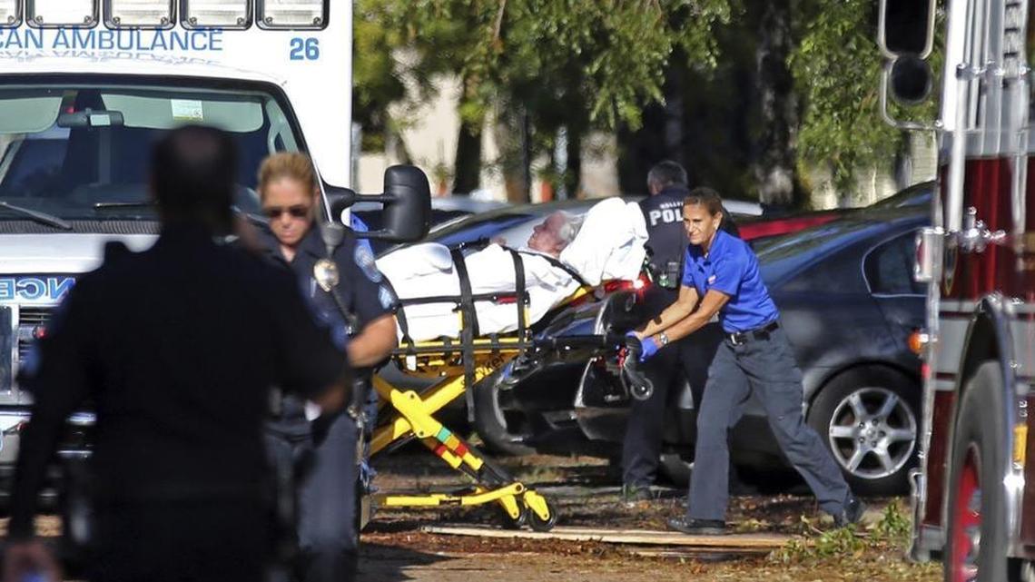 A patient is transported from The Rehabilitation Center at Hollywood Hills on Wednesday, September 13, 2017, after a loss of air conditioning due to Hurricane Irma. A total of 11 patients died.