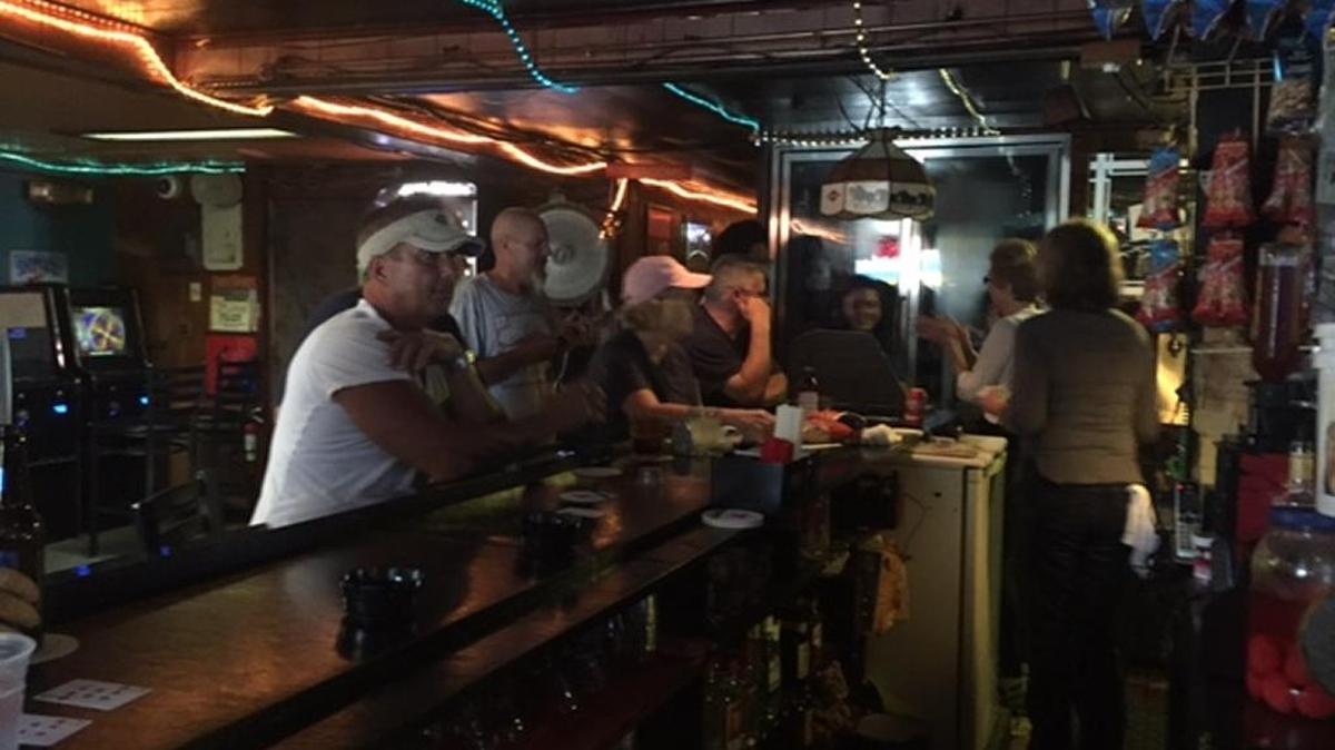‘We don’t close for anything,’ said Barbara Metzger, serving $1.25 orange and rasberry jello shots, Marlboros, pickled eggs and Budweiser at the Drift In, one of the only businesses in Bradenton, Fla., that was open Saturday night as Hurricane Irma approached. She has worked there 21 years. They did plan to close Sunday.