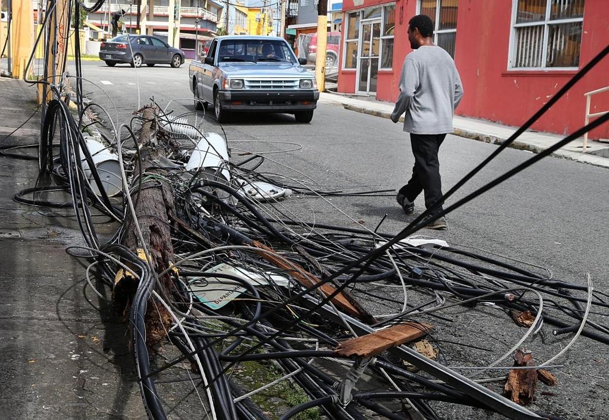 View of broken power lines poles on the streets of Yabucoa after Hurricane Maria,