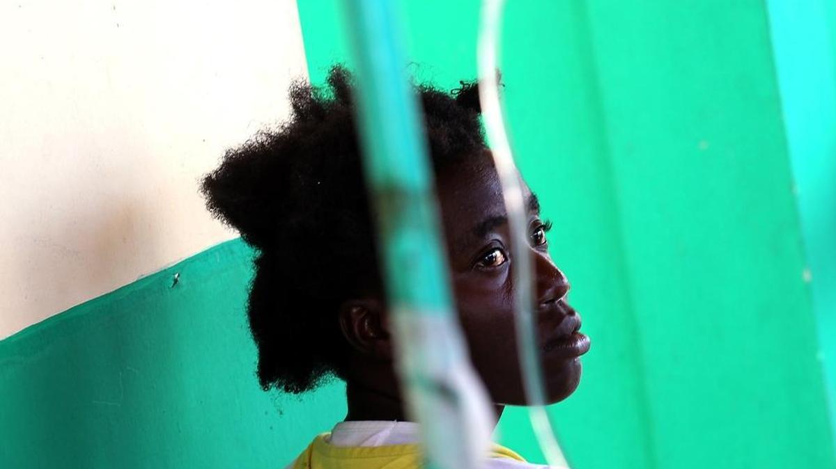 Nolan Hyppolite, 24, seeks help at a cholera clinic at Port Salut HCR Hospital in Haiti following Hurricane Matthew on Sunday, Oct. 9, 2016.