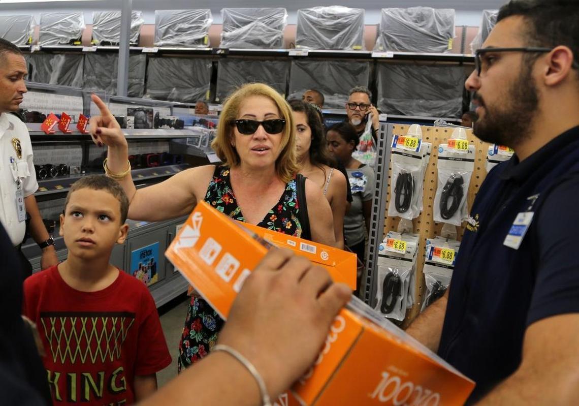 Walmart shoppers stand in line to purchase the D battery operated fans, but unfortunately there were not any available for sale due to shortage as many shoppers scrambled to purchase Hurricane supplies in the advance of Hurricane Maria in Puerto Rico's capital of San Juan on Tues., Sept. 19, 2017.