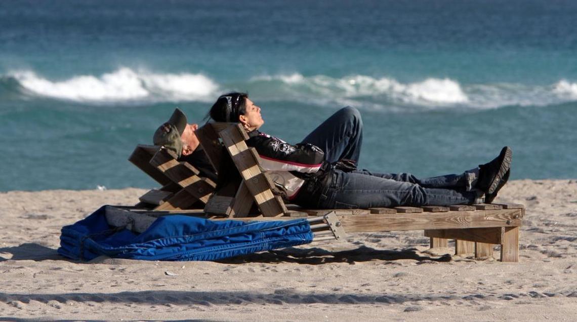 Nothing can stop some sunbathing in South Florida — not even a cold snap.
