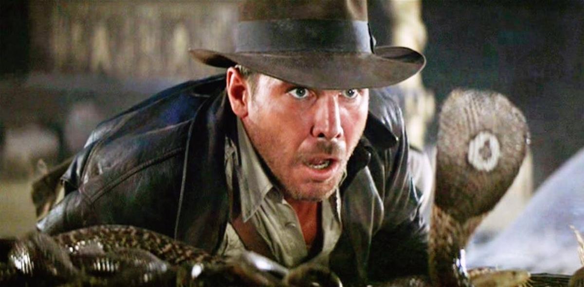 Harrison Ford, as adventurer Indiana Jones, recoils in terror of snakes in a scene from the 1981 movie, “Raiders of the Lost Ark.”