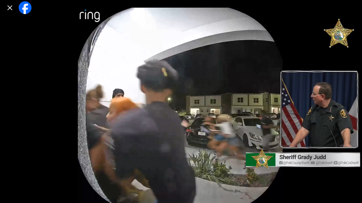 This image from a Ring camera shows the teens began to run when shots were fired nearby in the parking lot.