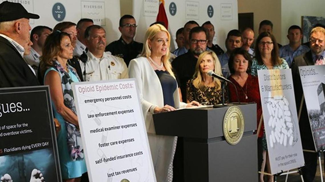 Florida Attorney General Pam Bondi announces her lawsuit against nation’s largest drug makers.