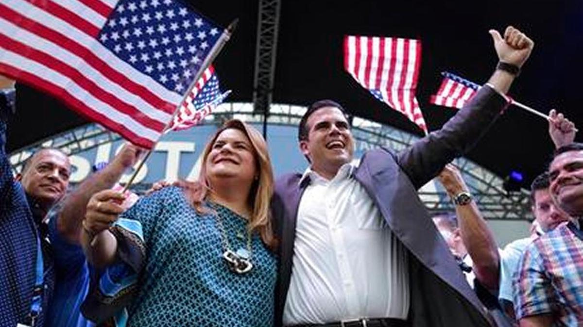 Puerto Rico’s Gov. Ricardo Rossello, right, and Congresswoman Jennifer Gonzalez celebrate the referendum results.