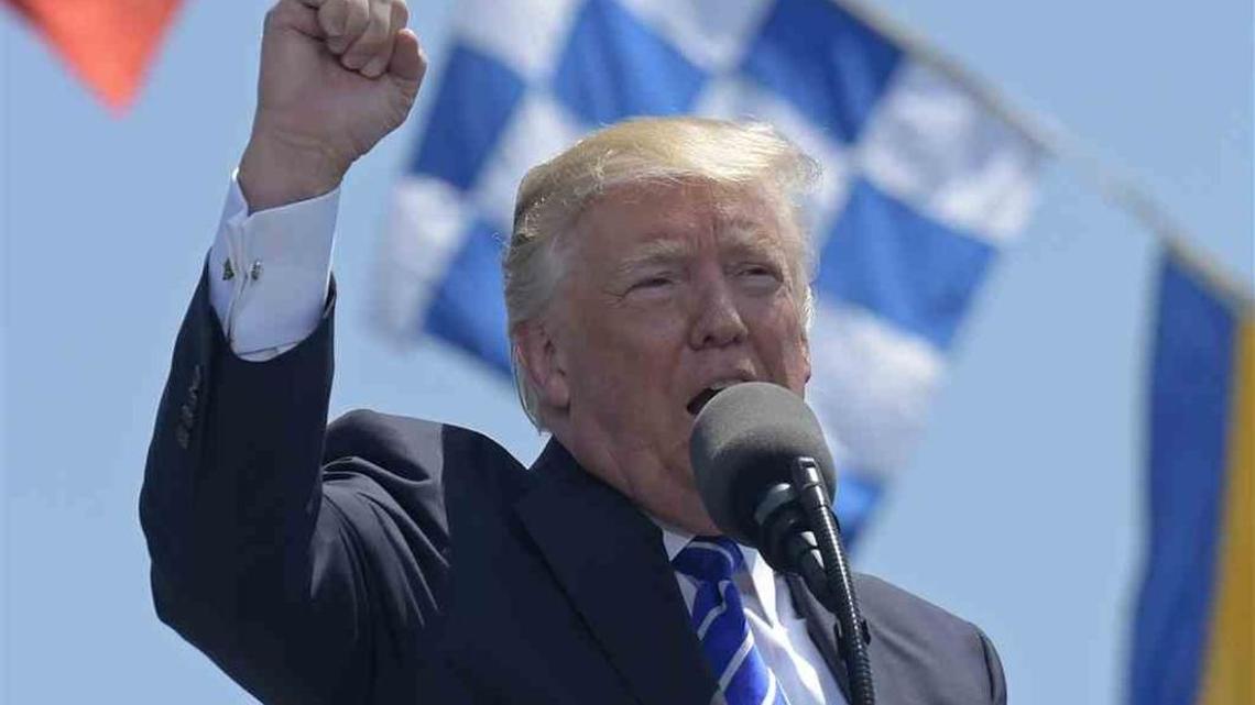 In his speesh to Coast Guard graduates, President Trump said he was being persecuted.