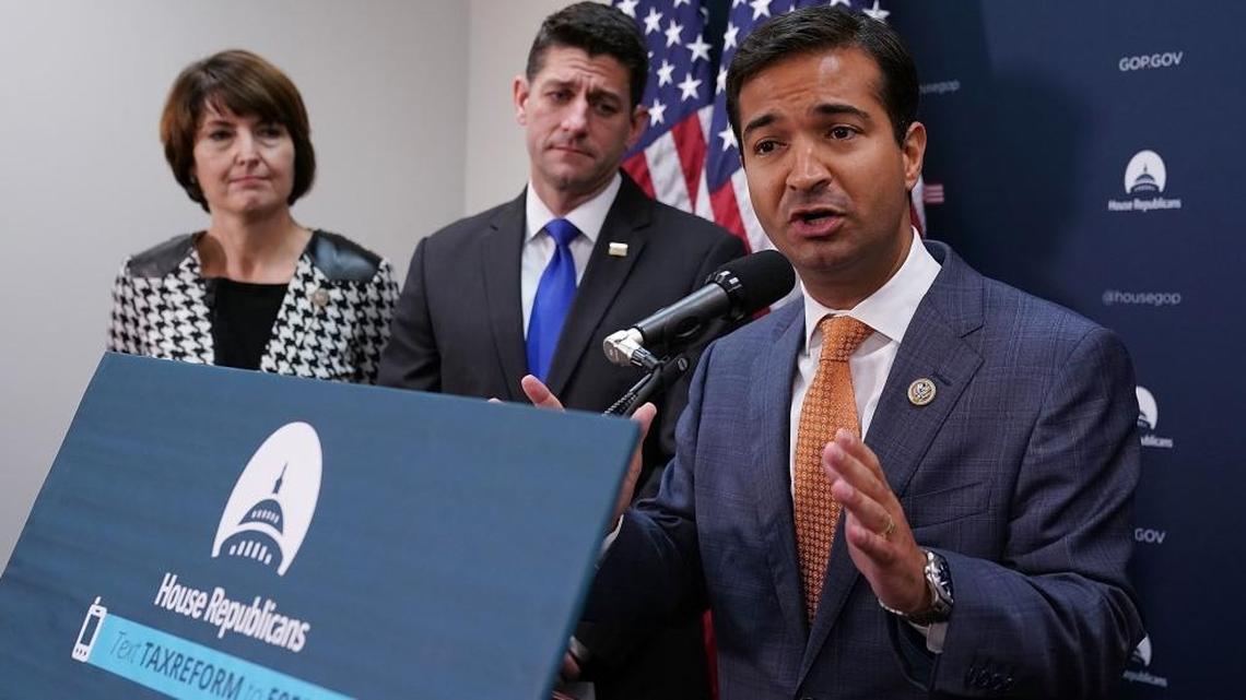 Rep. Carlos Curbelo, R-Fla., talks to reporters with Speaker of the House Paul Ryan, R-Wis., and Rep. Cathy McMorris Rodgers, R-Wash., last fall.   Curbelo and Rep. Mario Diaz-Balart, R-Fla., have helped craft an immigration compromise within the Republican Party that provides a path to citizenship for Dreamers, though the plan is more conservative than what the Miami Republicans would have wanted.