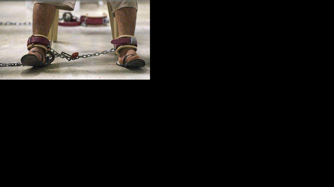 
SHACKLED: Guantánamo detainee in restraints. The Obama administration has restricted media coverage of the detention center.
