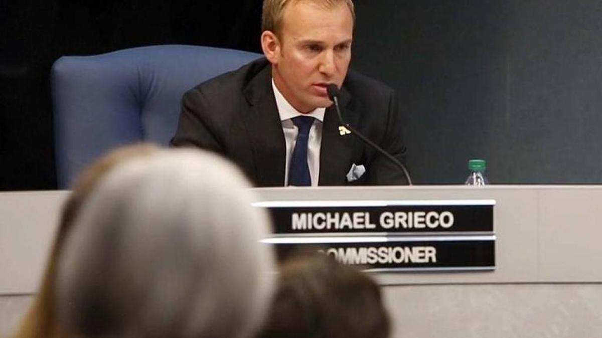 Michael Grieco announcing from the dais that he was dropping his re-election bid.
