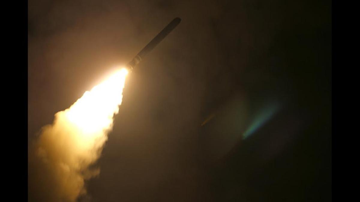 Guided-missile cruiser USS Monterey fires a Tomahawk land attack missile at Syria as part of an allied strike last week.