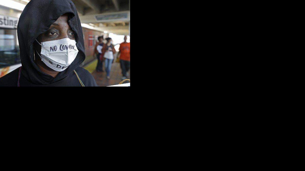 
LEFT UNCOVERED: In January, Klamath Fletcher and others passed out a petition and information about the estimated 160,000 Miami-Dade residents who are without health insurance because of the Legislature's refusal to expand Medicaid.
