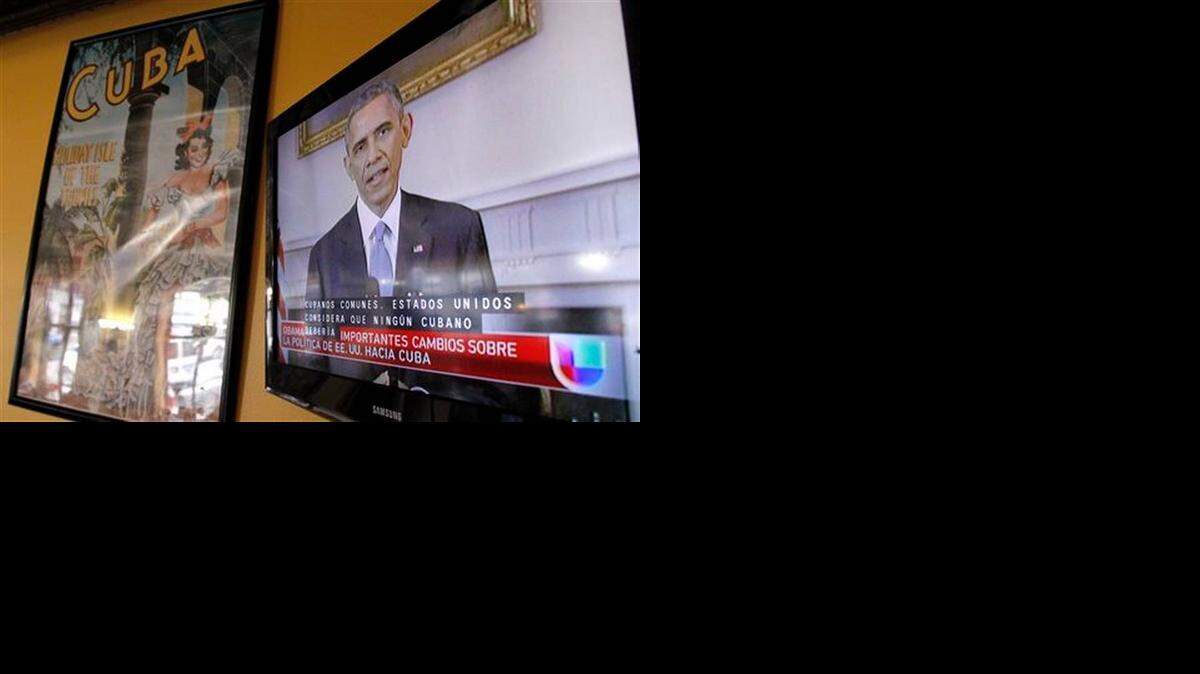 
In Miami, local Spanish-language television stations break in with the big news about renewed U.S. ties with Cuba. Over 1 million Cuban exiles who fled Fidel Castro’s Cuba call South Florida home.
