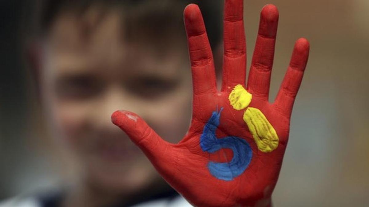A small boy at a pre-election rally outside Bogota made clear he’s for peace.