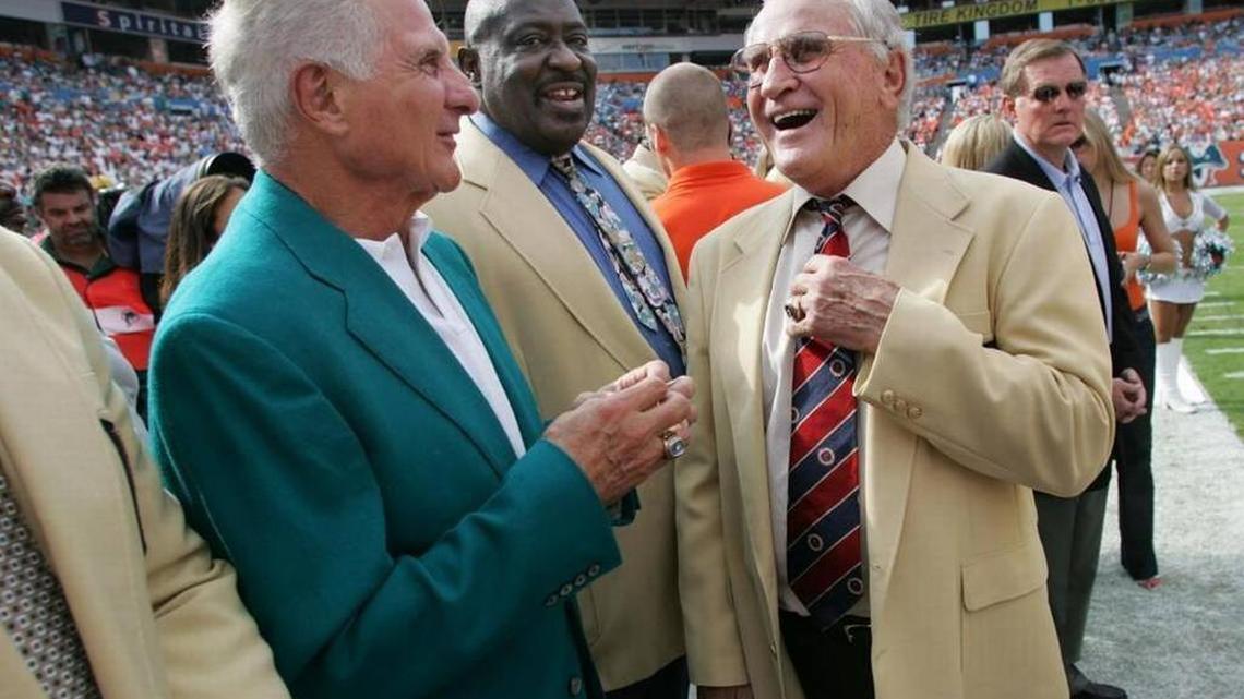Nick Buoniconti, left, Larry Little, center, and Don Shula chat before a halftime Hall of Fame ring presentation in November 2005.