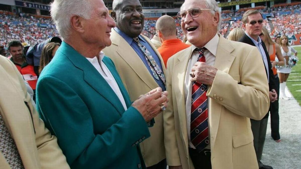 Nick Buoniconti, left, Larry Little, center, and Don Shula chat before a halftime Hall of Fame ring presentation in November 2005.