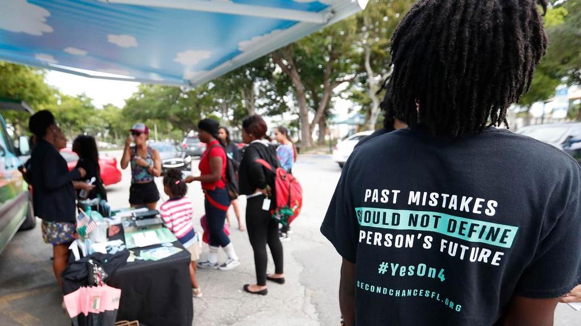 In October, voters gathered around a Ben & Jerry’s “Yes on 4” truck at Charles Hadley Park to learn about the amendment.